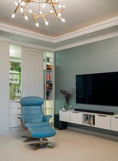 Step into a world where versatility meets design brilliance. Presenting our latest creation: a blue family living area that’s not just a living room; it’s a dynamic haven that evolves with your needs. Tv With Bar Unit, Book Shelf And Bar Unit, Living Room With Tv And Armchair, Bar Unit With Tv Unit, Green And White Tv Unit, Tv Unit And Library, Tv Unit With Library, Tv Unit Library, Library With Tv Unit